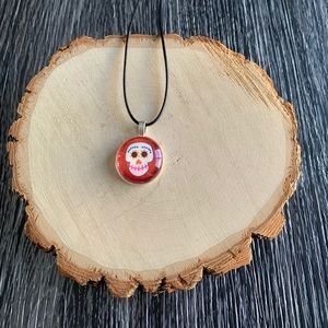 Coco handmade necklace with red background